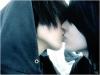 EMO girl and boy kissing