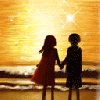 holding hands on the beach